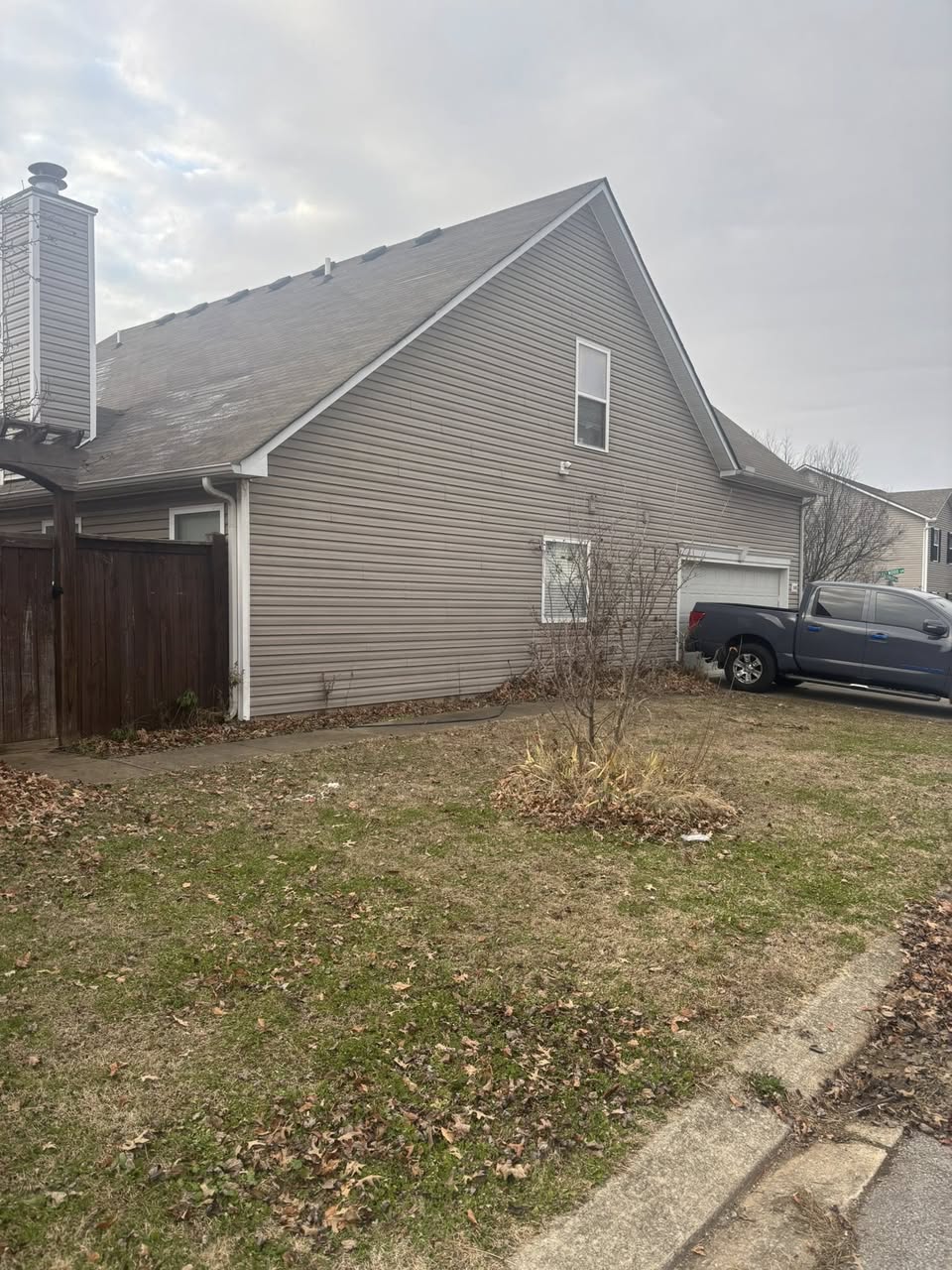 Cluttered garage before cleanout