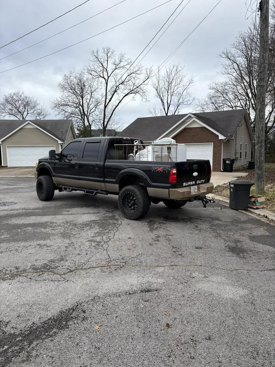 Trash Titans truck and trailer for appliance removal in Middle Tennessee